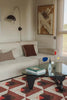 Tessera wool rug by Lorena Canals in red, featuring a geometric patchwork design