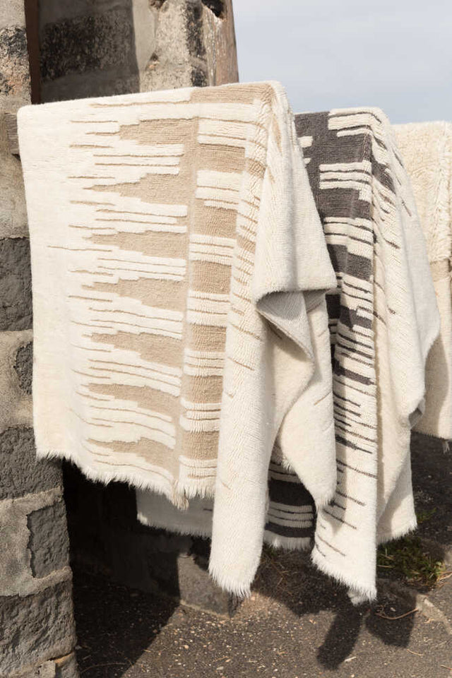 Lorena Canals Zagros Wool Area Rug in natural sandstone with a zigzag pattern, showcasing soft wool texture and modern design.