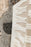 Lorena Canals Zagros Wool Area Rug in natural sandstone with geometric zigzag pattern, soft wool material.