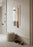 Woud Denmark Logs Mirror, a minimalist accessories piece featuring three round mirrors resembling stacked logs.
