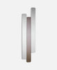 Three wooden Log mirrors by Woud Denmark, minimalist accessories with natural wood finishes and unique log-shaped frames.