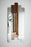 Woud Denmark Logs Mirror, a modern accessories piece featuring three circular mirrors resembling logs, on a neutral background.