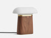 Walnut Nova Table Lamp by Woud Denmark, modern lighting fixture with sleek design and warm wood finish.
