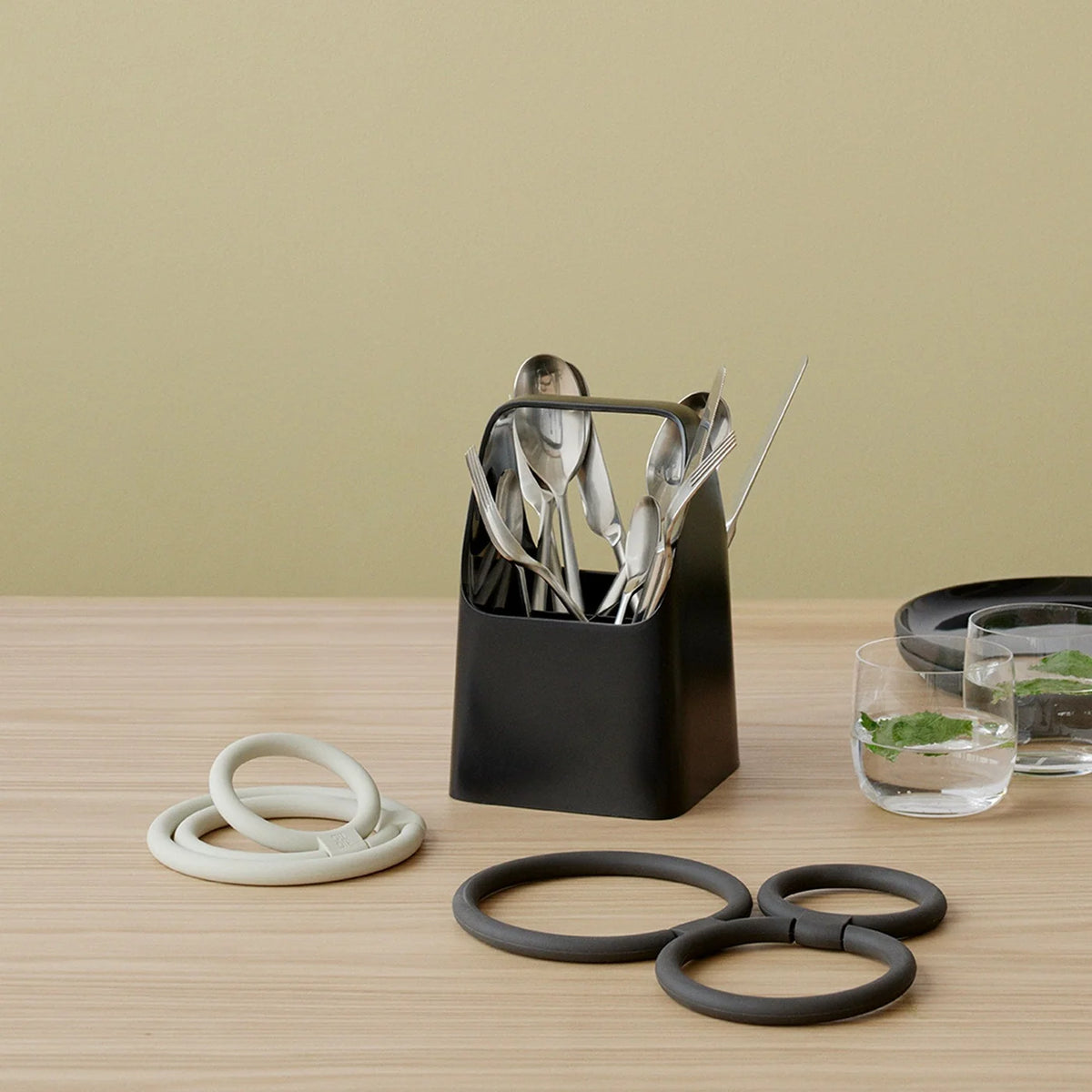 Rig-Tig Circles Trivet, round metal accessory with interconnected circular design for protecting surfaces from hot cookware.