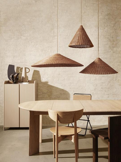 Ferm Living Dou lampshade for lighting, showcasing a woven design in natural tones with a sleek, modern shape.