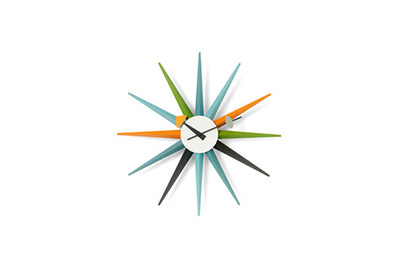 Vitra Sunburst Clock accessory featuring a vibrant, sunburst design with a round face and decorative rays, stylish home decor piece.