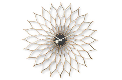 Vitra sunflower clock accessory featuring a vibrant sunflower design, perfect for stylish home decor.