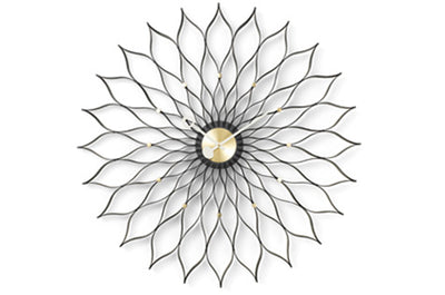 Vitra sunflower-shaped clock accessory with a vibrant sunflower design and modern style, perfect for decorative wall decor.