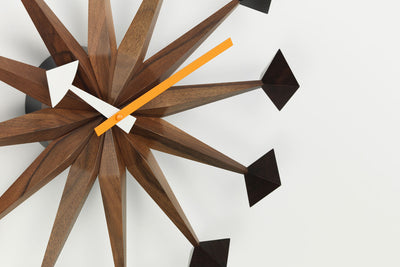 Vitra Polygon Clock accessories with a geometric, polygonal design mounted on a wall.
