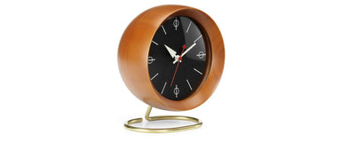 Vitra Chronopak desk clock accessory with a sleek, modern design and minimalist face on a wooden surface.