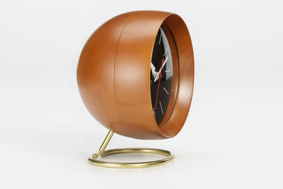 Vitra Chronopak desk clock accessory with a sleek, modern design and a round face showing time on a minimalist surface.