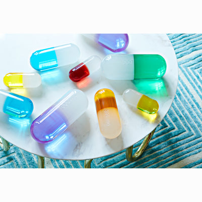 Small acrylic pill accessory by Jonathan Adler featuring clear lucite with a sleek, modern design.