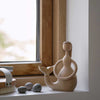 Kids' mermaid sculpture by Hans Bolling for Architectmade, detailed wooden sea creature for children's decor.