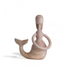 Kids wooden mermaid sculpture by Hans Bolling for Architectmade, featuring a whimsical mermaid figure with detailed craftsmanship.