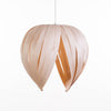 Red Gladys pendant light by Atelier Cocotte, featuring a large white birch-inspired shade, perfect for modern interior lighting.