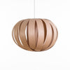 Ruth small pendant light by Atelier Cocotte featuring a white oak and birch wood shade, modern lighting fixture for interior decor.