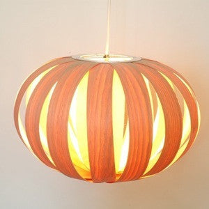 Small oak and birch white pendant light from Atelier Cocotte's Ruth collection, showcasing minimalist lighting design.