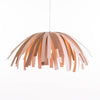 White Tina Pendant light by Atelier Cocotte, featuring a modern lighting design with a short hair-style shade.