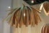White Tina Pendant light fixture by Atelier Cocotte, featuring a sleek modern design and smooth finish, ideal for contemporary lighting.