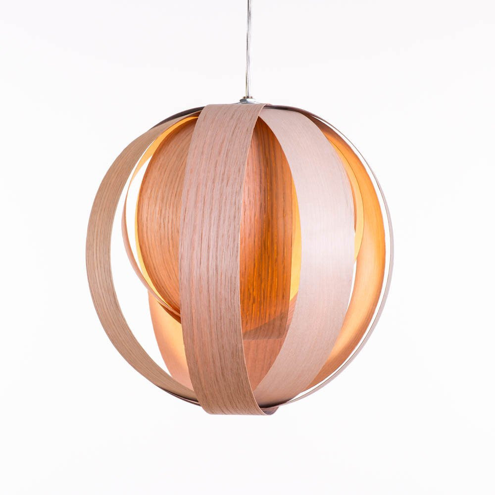 White Boules 'Mix D' pendant light by Atelier Cocotte, showcasing a modern lighting fixture with spherical design.