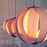 White Boules 'Mix D' pendant light by Atelier Cocotte, featuring a modern, spherical design for stylish interior lighting.