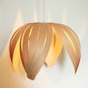 White walnut Ti-Fleur pendant light by Atelier Cocotte featuring a delicate floral-inspired design and elegant lighting style.