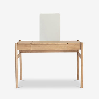Oak Pala Dressing Table by Case in a bedroom setting, featuring a sleek design with a mirror and storage drawers.