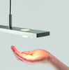 Cerno Brevis Linear LED Pendant in brushed aluminum with 2700K warm light, modern lighting fixture made in the USA