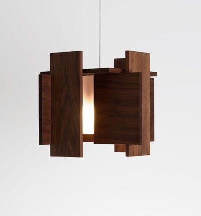 Dark-stained walnut Abeo LED pendant light by Cerno, featuring 2700K warm LED illumination, made in the USA.