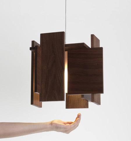 Dark stained walnut Abeo LED pendant light by Cerno, featuring warm 2700K LED illumination, made in the USA.
