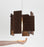 Dark stained walnut Abeo LED pendant light by Cerno, featuring warm 2700K LED illumination, made in the USA.