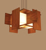 Dark stained walnut Cerno Muto suspension light, modern lighting fixture with sleek design, made in the USA.