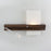 Levo wall sconce by Cerno, made in the USA, featuring sleek lighting design and a visible cord, shown mounted on a wall.
