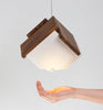 Cerno Mica LED pendant light with oiled walnut finish, 2700K warm glow, modern lighting fixture made in the USA