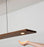 Vix Linear LED Pendant by Cerno in dark stained walnut with 2700K LED lighting, made in the USA, modern minimalist lighting fixture.