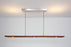 Cerno Vix Linear LED Pendant in dark stained walnut with warm 2700K light, modern lighting fixture made in the USA