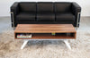 Elko coffee table by Eastvold Furniture with walnut finish and black metal legs, modern tables for living room decor.