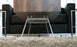 Walnut Elko Coffee Table by Eastvold Furniture featuring a sleek, modern design with clean lines and a smooth surface.