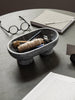 Black Alza bowl by Ferm Living, stylish ceramic accessory with a sleek, modern design for decorative or practical use.