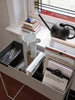 Black Ferm Living Orb Watering Can for accessories, featuring a sleek, modern design with a rounded, orb-shaped body.