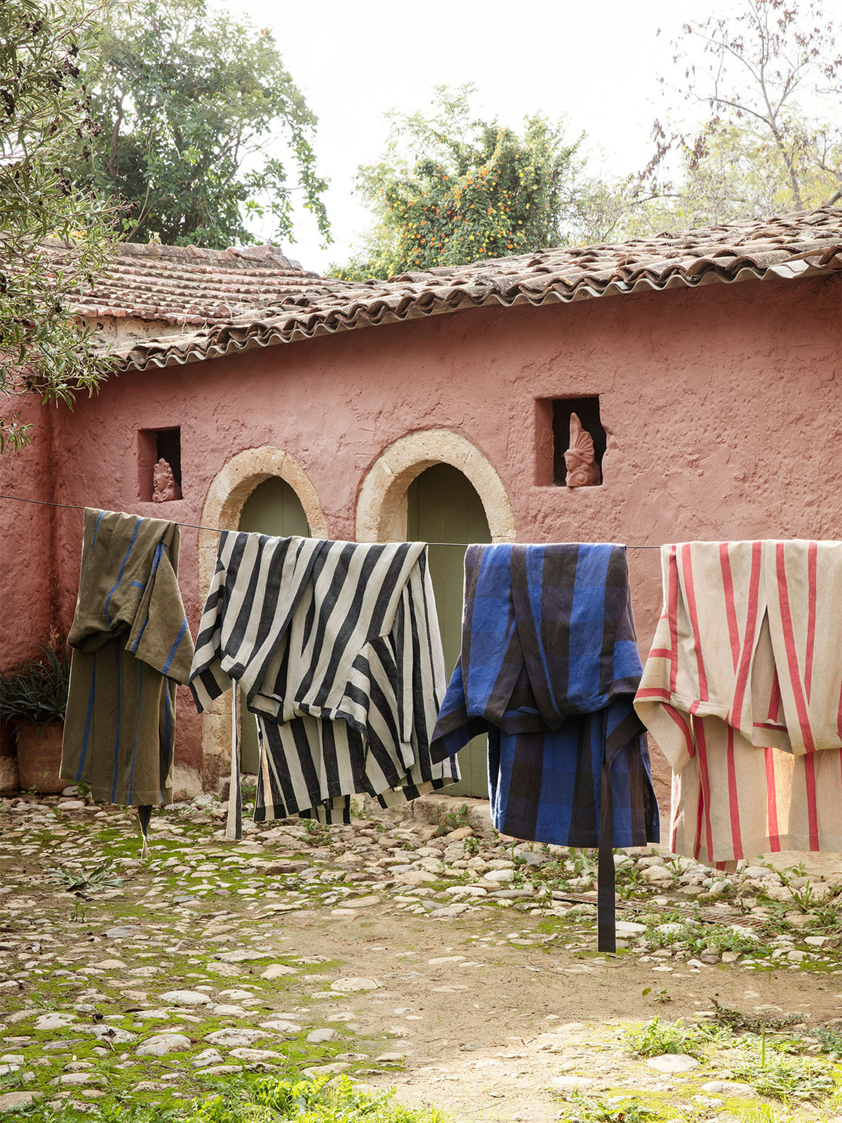 Camel-red Ferm Living Field Robe accessory with a soft, textured fabric and minimalist design, perfect for stylish home decor.