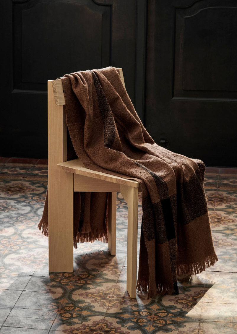 Ferm Living Dry Blanket accessory featuring soft, textured fabric in neutral tones for cozy home decor.