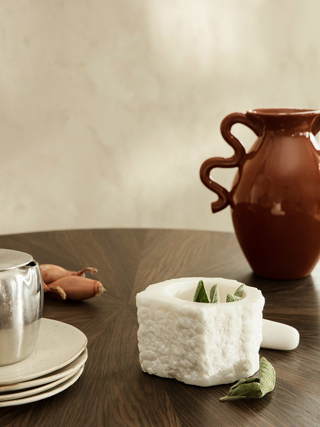 Ferm Living Petra Mortar, a stylish gray ceramic accessories piece with a textured surface, ideal for kitchen or decor use.