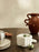 Ferm Living Petra Mortar, a stylish gray ceramic accessories piece with a textured surface, ideal for kitchen or decor use.