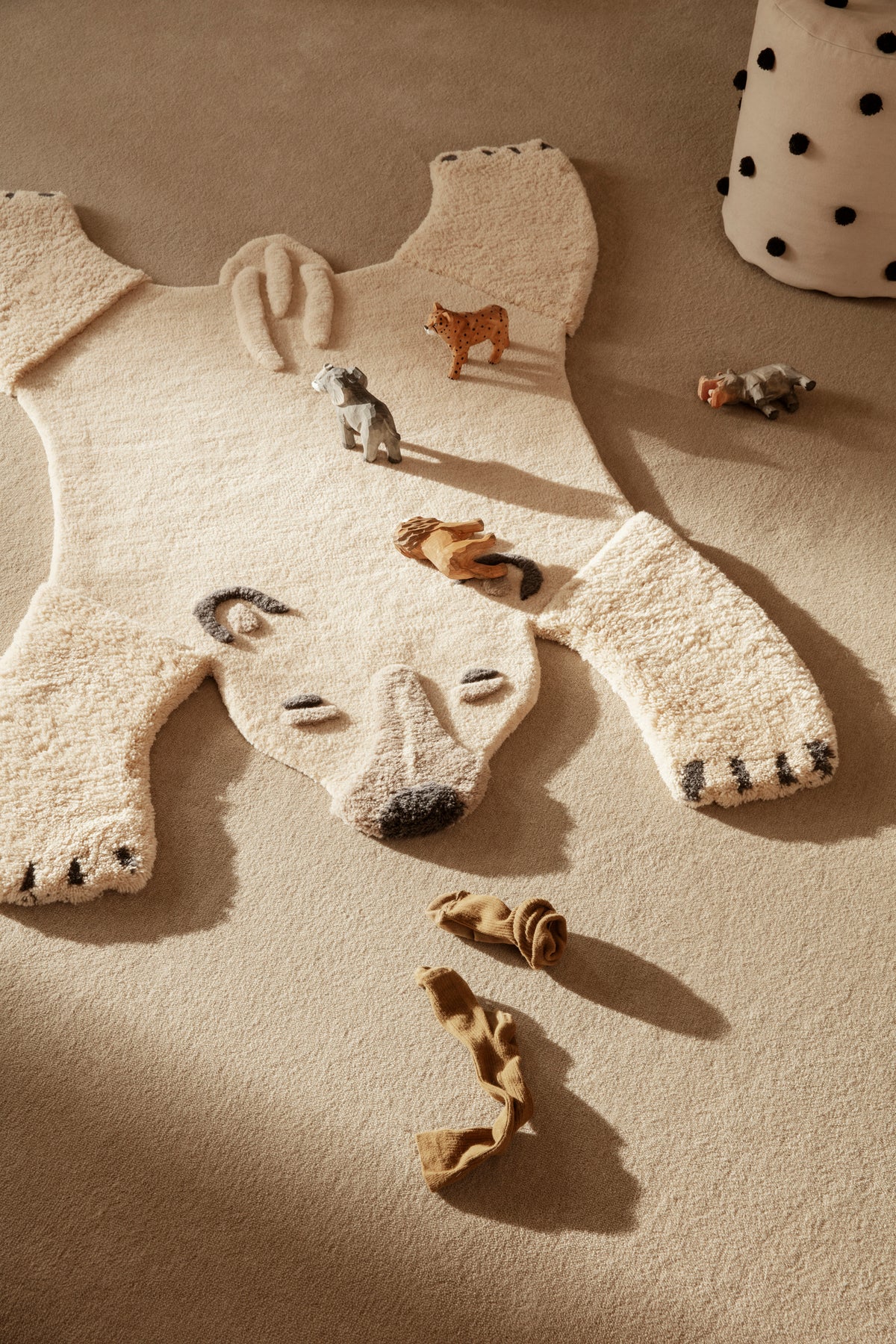 Ferm Living kids animal tufted polar bear rug featuring soft, plush polar bear design for children's room decor.