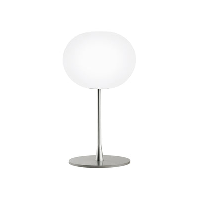 Silver Glo-Ball Flos table lamp with spherical design and sleek modern style, perfect for ambient lighting.
