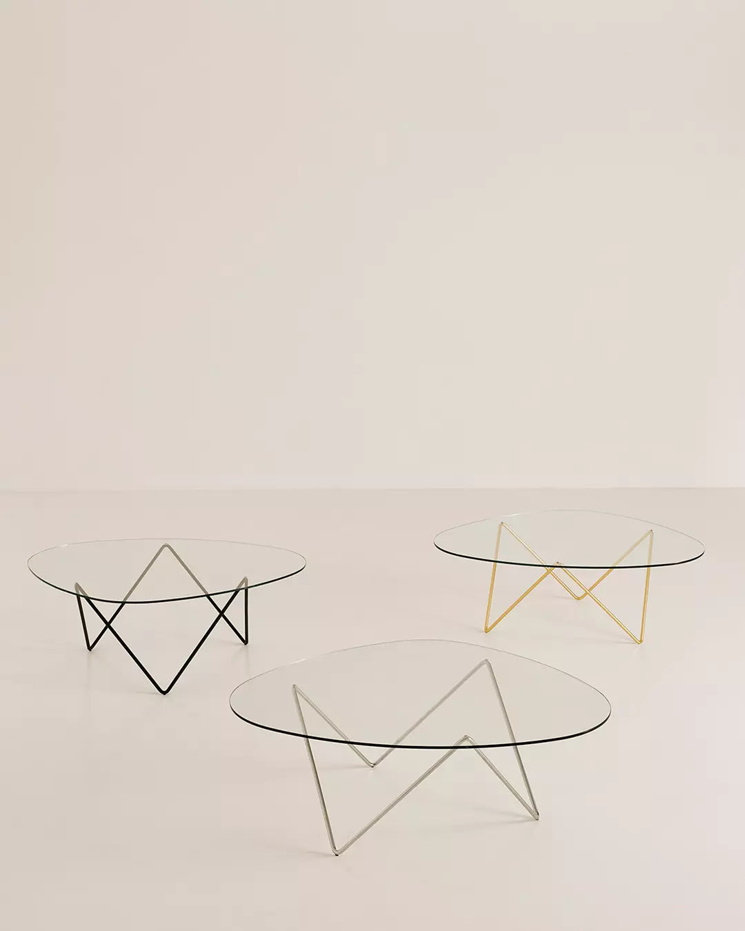 Gubi Pedrera coffee table with chrome finish and smoke-colored structured glass top, modern design for living room decor.