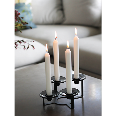 Holmegaard Lumi Candle-Cuffs in flat smoke glass, elegant accessories designed to hold candles with a sleek, modern look.
