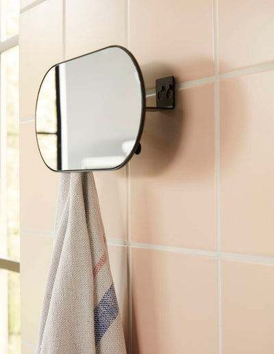 Black Surprise Mirror accessory by Hübsch with a sleek, round design ideal for modern interior decor.
