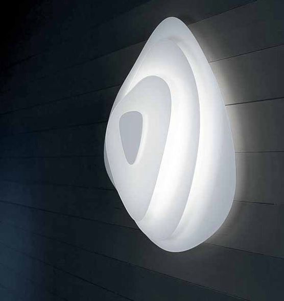 Itama Smoke wall and ceiling light fixture with a smoky glass shade, modern lighting design for indoor spaces.